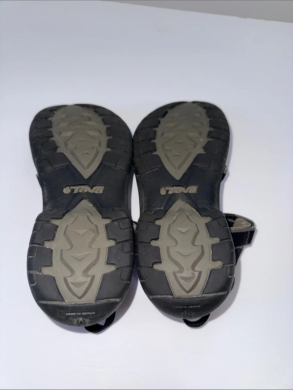 Teva women’s Black and Gray Adjustable Strap Sandals